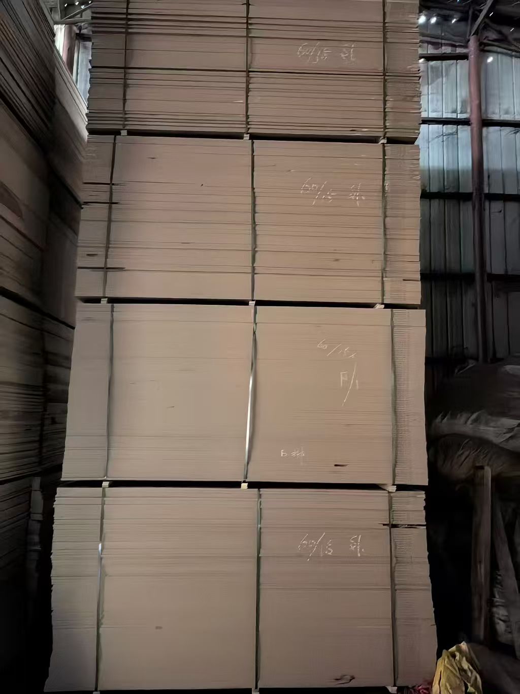 Raw MDF board stacks stored at the Nantong factory