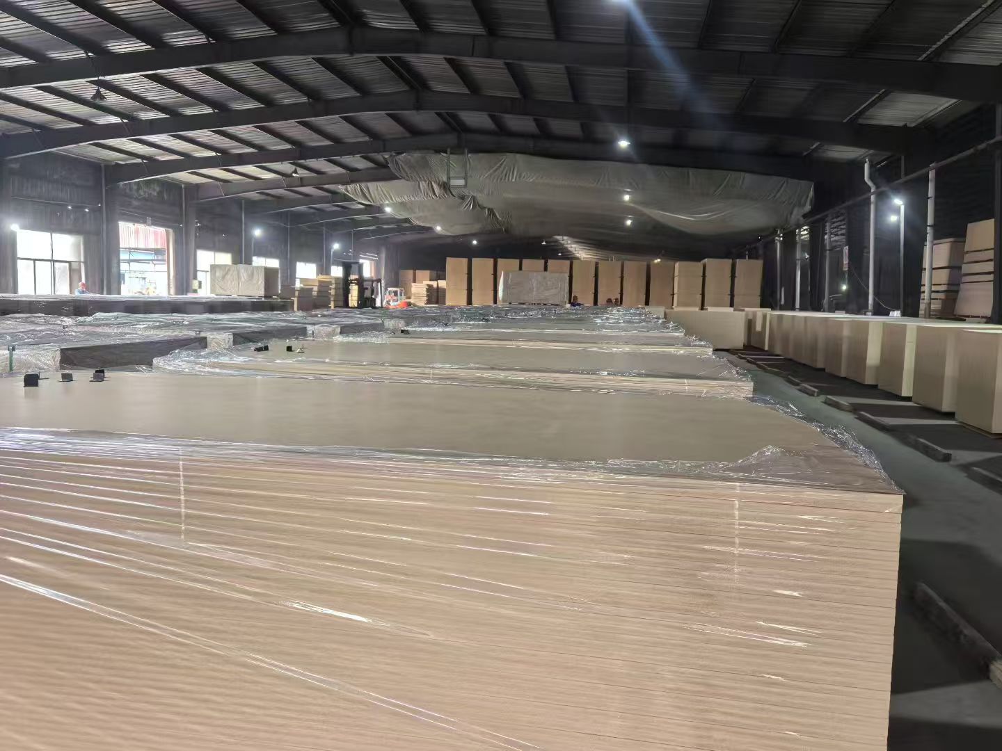 Wrapped raw MDF sheets prepared inside the factory