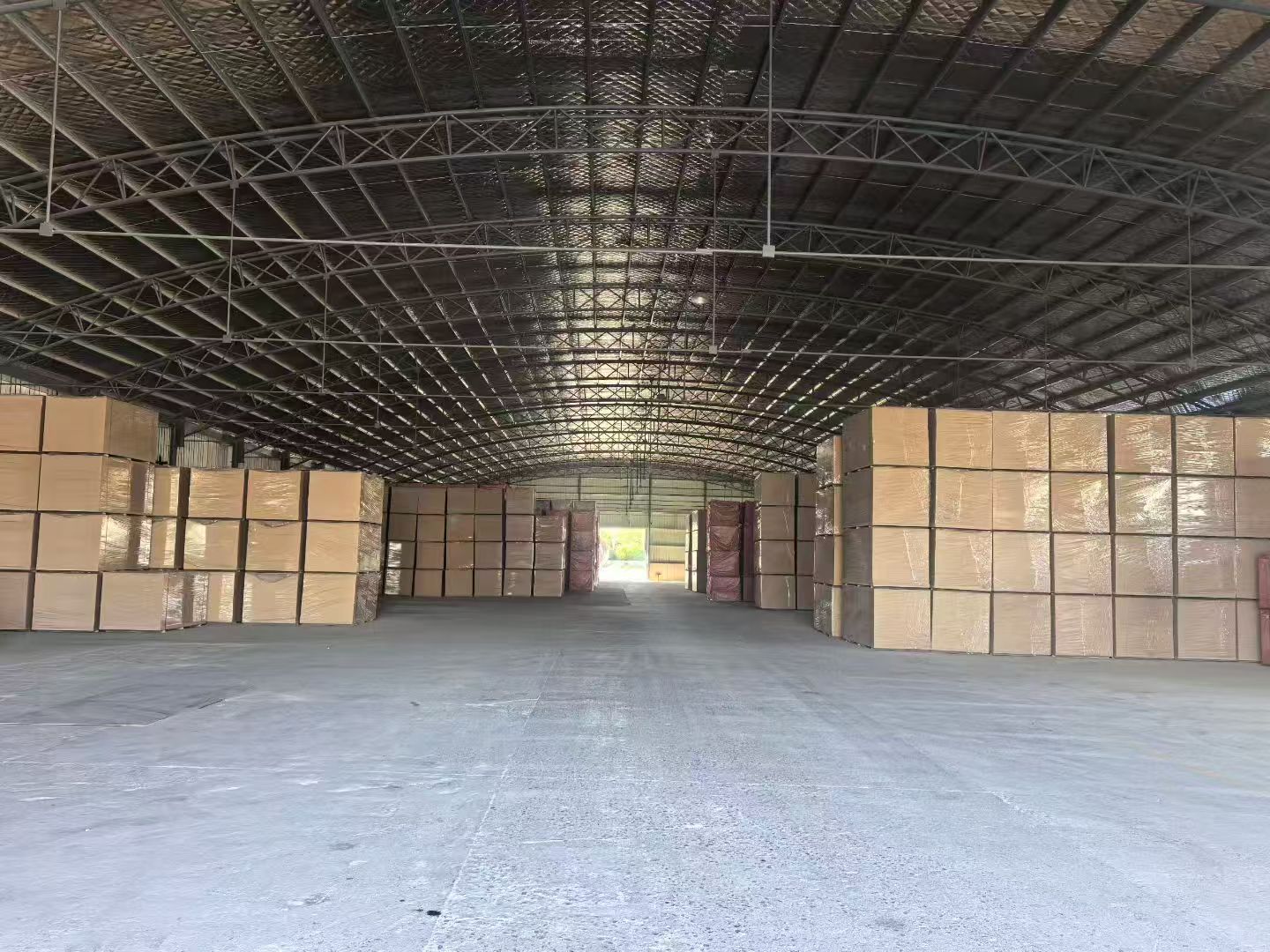 Home MDF panel stacks inside the supplier’s warehouse